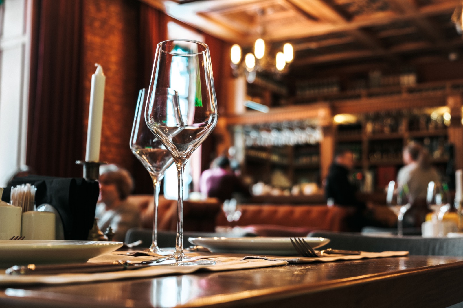 Fine dining table setting with wine